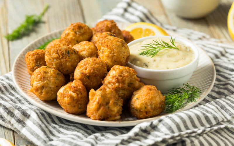 a plate of round crab poppers